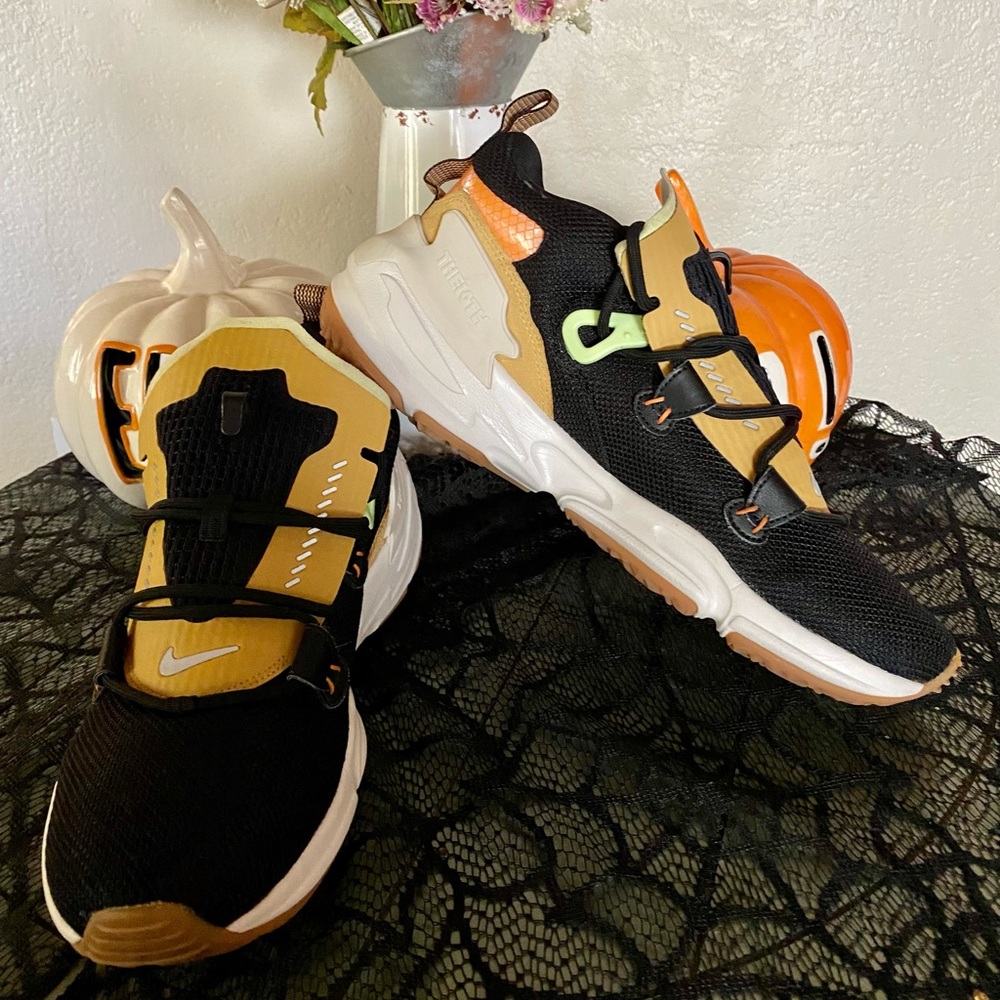 Black and gold NIKE men’s 10 “Theioth” new w out box.